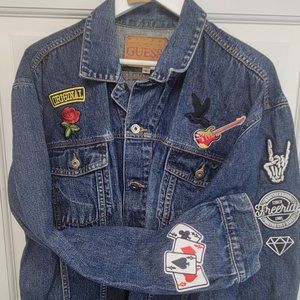 Adult extra large denim jacket with iron on patches